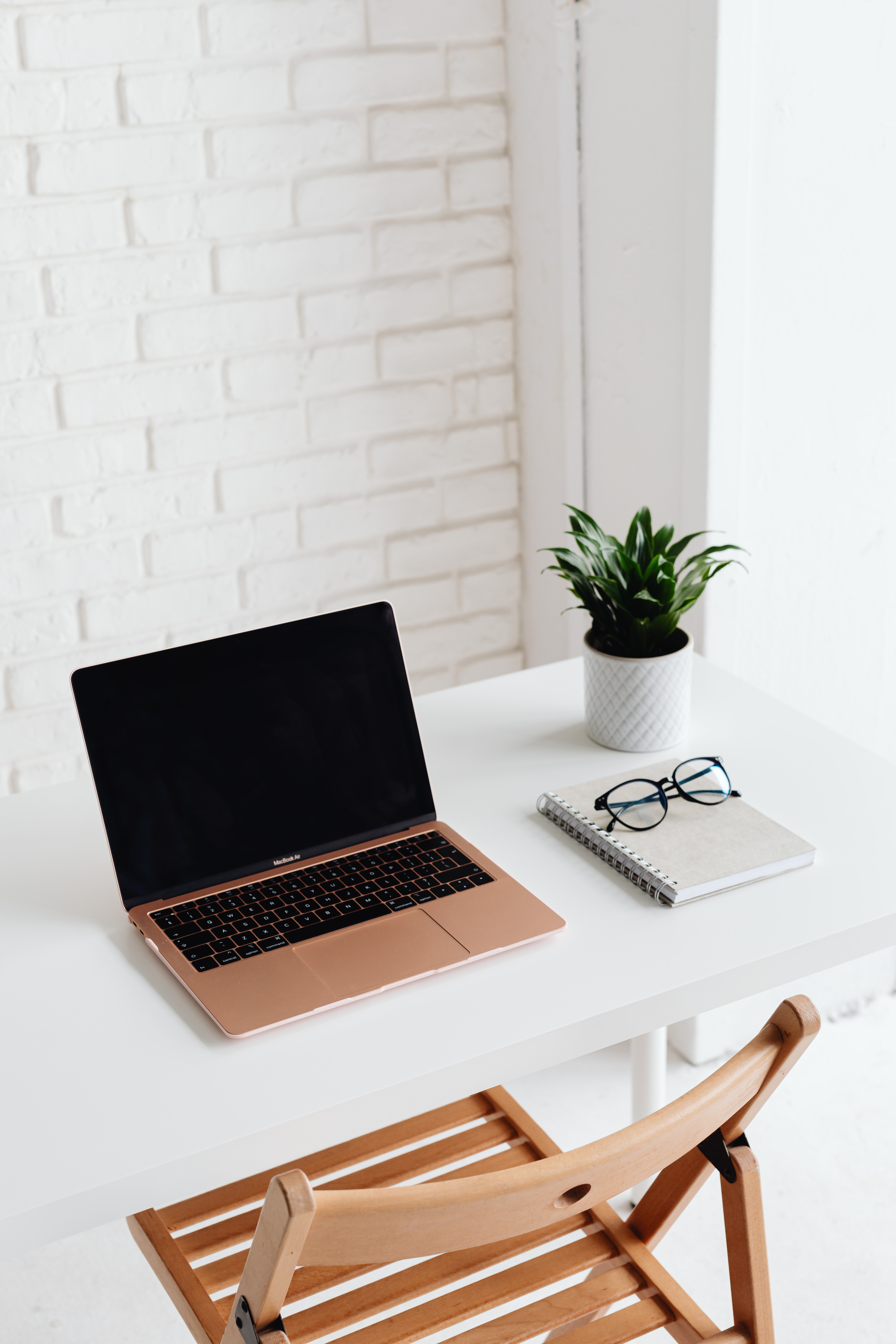 Macbook Pro on White Table